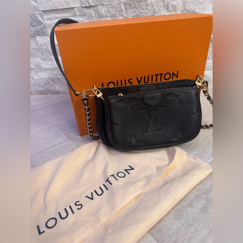 Louis Vuitton Multi Pochette Accessoires
In black Monogram Empreinte Leather